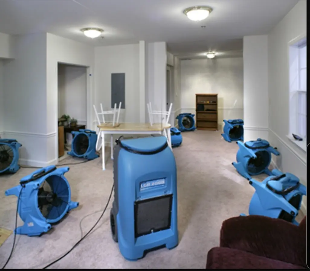 Air movers and dehumidifier setup for Water Damage Restoration in Sycamore